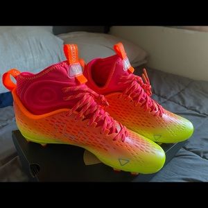 Brand New mens cleats. New in box never worn!